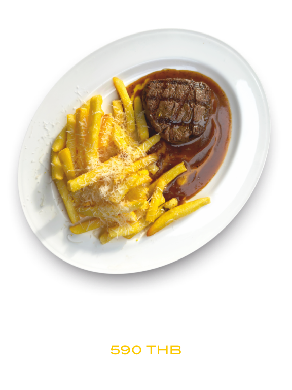 Beef steak with French fries and pepper sauce